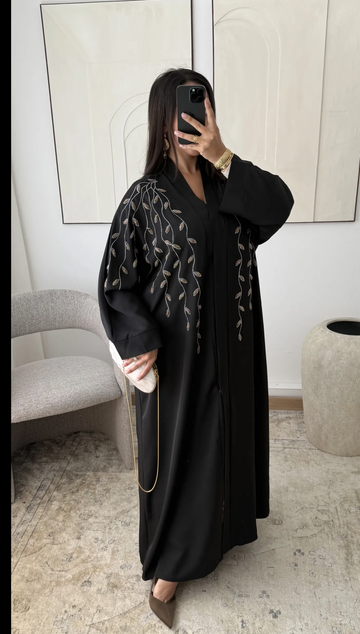 Abaya Dubaï  noire brodée dorée avec pressions – Abaya chic et élégante